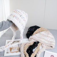 Gorro de invierno de piel sintética afelpada con orejeras y lazos trenzados para mujer, con confeti de colores, ideal para clima frío, venta al por mayor.
