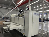 Machine de fabrication de boîtes en carton ondulé semi-automatique monobloc avec clouage à couture