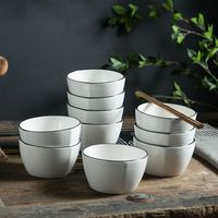 Service de table en céramique blanche minimaliste moderne avec bordure noire, assiettes et bols en porcelaine de style nordique