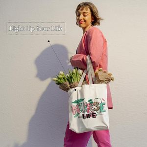 Bán Buôn Tùy Chỉnh In Logo Thư Mô Hình Y Tá Tote Túi Vải Khuyến Mại Tái Sử Dụng Của Phụ Nữ Điều Dưỡng Mua Sắm Túi - Product Image 4