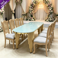 Chaise de salle à manger élégante en résine plastique couleur bois PP avec coussin en tissu pour mariage, hôtel, conférence, église