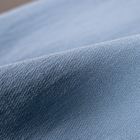 Robe chic pour femmes, bleu clair, col rond, boutons dorés, poches à rabat, manches à revers, coupe décontractée, mini-robe décontractée