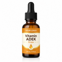 Gouttes personnalisées de vitamines ADEK à base d'huile MCT, fabricant OEM de compléments alimentaires GMP, soutien de la densité osseuse, de la fonction immunitaire et cardiovasculaire