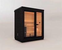 Sauna à vapeur compact en bois massif, design cube, écologique, avec verre panoramique, pour une relaxation moderne en bord de mer et en vacances