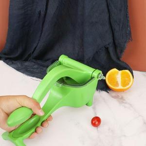 Venta caliente accesorios de cocina Nuevo Manual portátil naranja Mini exprimidor para frutas y verduras rápido y fácil de usar - Product Image 4