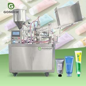 Máquina semiautomática de llenado y sellado de tubos de metal Hengxing para cosméticos, con mesa de trabajo sellada y sistema de cola suave. - Product Image 1