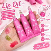 Huile à lèvres repulpante rose transparente végane à marque privée, vente en gros, faible MOQ, haute qualité, brillante, aromatisée, gloss à lèvres transparent, huile à lèvres