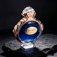 Flacon de parfum rond en verre de luxe avec pompe pulvérisatrice 30ml 70ml 100ml, boîte d'emballage personnalisée avec logo imprimé pour marque de parfum