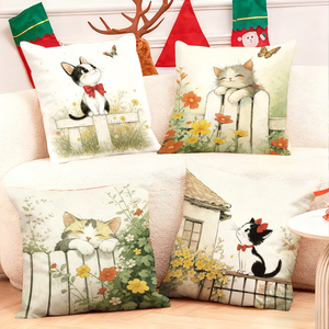 Những chú mèo dễ thương trong cảnh vườn hoa trên những chiếc gối ấm áp với trang trí lễ hội ở phía sau. - Product Image 1