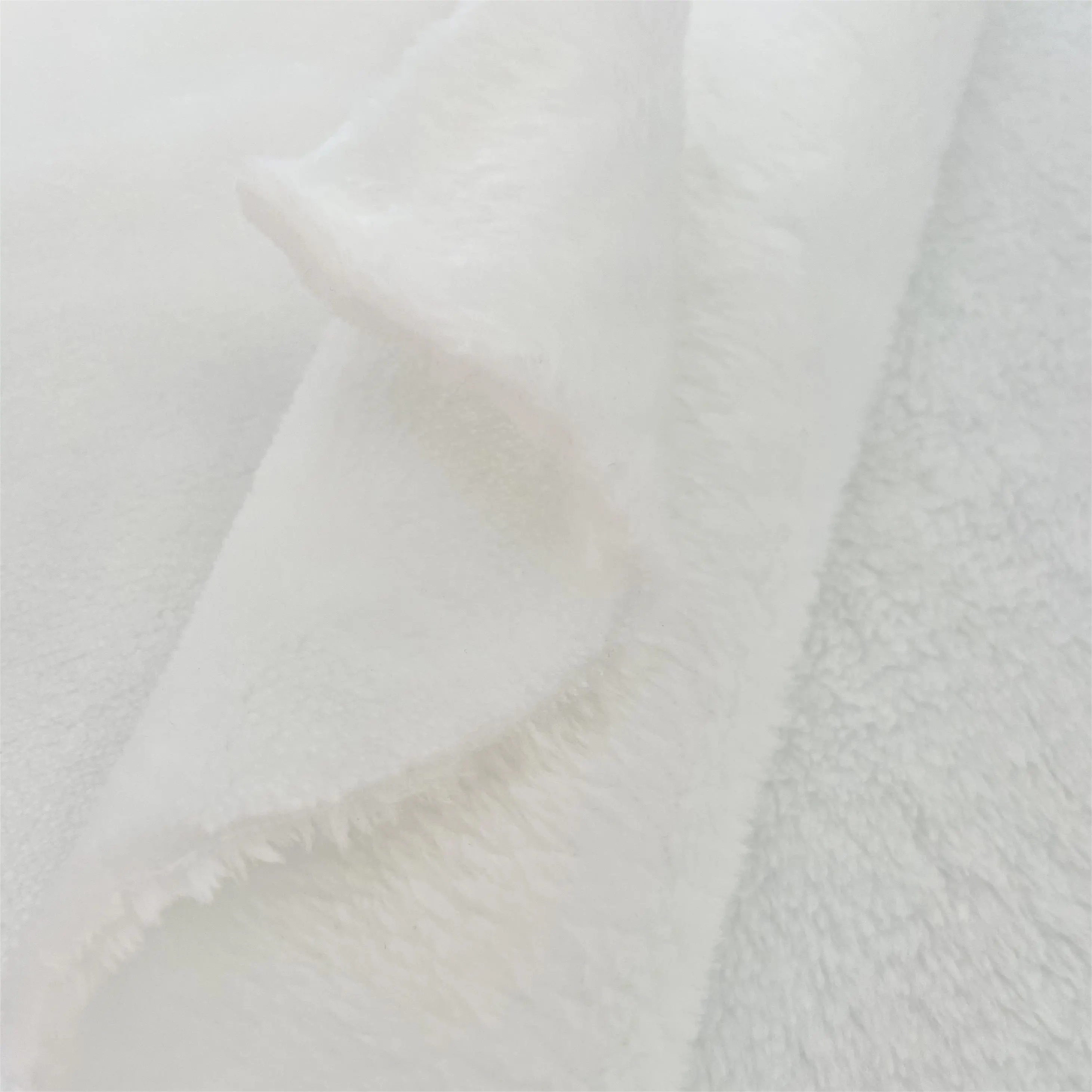 Haute qualité 100% polyester double face flanelle tissu doux pour la peau velours polaire peluche vêtements chauds textiles de maison