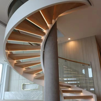Villa moderne de luxe escalier intérieur en colimaçon en acier finition or escalier incurvé avec lumière LED chaude garde-corps en verre pour appartements