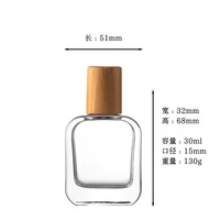 Vente en gros de flacons de parfum en verre transparent de 30 ml, 50 ml et 100 ml avec pulvérisateur à pompe et couvercle en bois pour parfum, flacon cosmétique sérigraphié