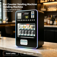 Mini distributeur automatique mural pour snacks et produits, avec distributeur à ressort spiralé et accepteur de pièces et billets.