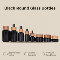 Flacon en verre noir à épaules arrondies avec couvercle en bois pour l'emballage des soins de la peau, des lotions et des shampoings