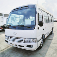 Voitures d'occasion de haute qualité remises à neuf T-o-y-o-t-a Coaster Kowloon Motors 21 places Véhicule léger pour passagers Mini-bus à vendre
