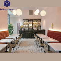 Tables de salle à manger DeliveryStone avec dessus en pierre de quartz