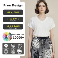 Kaos rajutan elegan warna polos dengan kerah V dan bahu terbuka, bordir bunga tiga dimensi, atasan lengan pendek longgar.