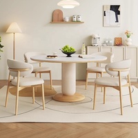 Ensemble de meubles de salle à manger extensible et pliable de style nordique moderne, table ronde aspect marbre avec base sur piédestal, 4 chaises avec structure en bois