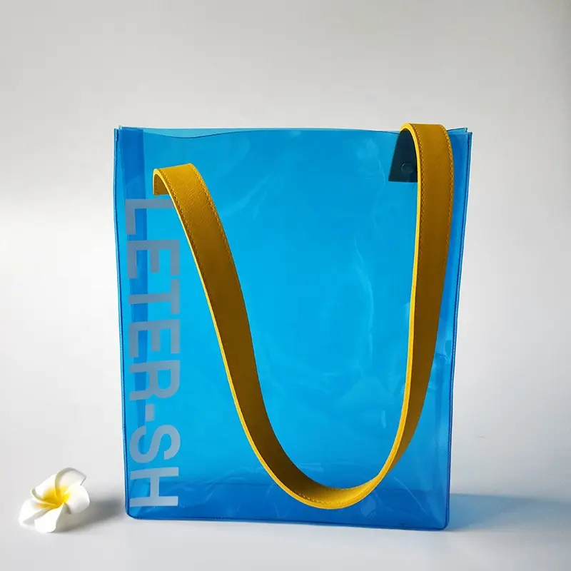 wholesale clear blue pvc shopping tote bag with PU leather handle