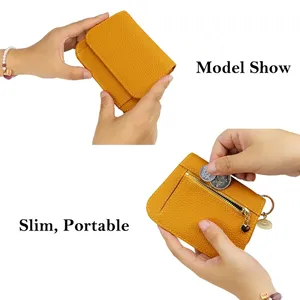 กระเป๋าสตางค์ AndoBag RFID แบบสั้นสำหรับผู้หญิง หนังวัวแท้ ความจุเยอะ พร้อมพวงกุญแจ ช่องใส่บัตร แฟชั่นกระเป๋าสตางค์แบบสามพับ รุ่น 1458 - Product Image 4