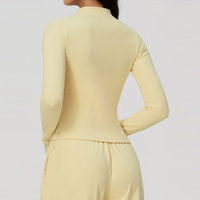 Veste de sport athleisure zippée pour femme, en polaire thermique côtelée, avec passe-pouces, manches longues, coupe ajustée, pour la course et l'entraînement, chaude