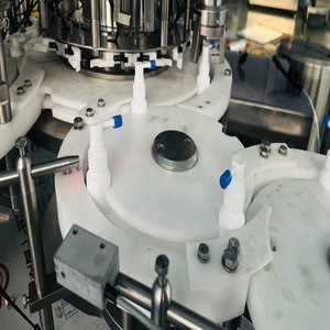 Máquina de llenado y tapado de gotas Tinni de <span class=keywords><strong>60</strong></span> <span class=keywords><strong>ml</strong></span>, línea de producción automática de llenado de botellas a presión, línea de producción de 10ml - Product Image 2