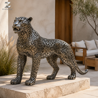 Sculpture de léopard creuse en acier inoxydable, artisanat métallique découpé au laser, statue animale durable pour la décoration de paysages d'hôtels, villas et jardins
