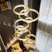 Lustre contemporain en cristal de grande taille avec télécommande, design élégant et moderne en forme d'anneau pour escalier moderne haut de gamme, hauteur réglable
