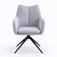 Fauteuil moderne rembourré à dossier haut avec coussin moelleux et base pivotante à 360 degrés en métal noir robuste, chaise de salle à manger de luxe
