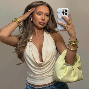 Vente chaude européenne et américaine : Nouvelle mode automne-hiver, Vêtements pour femmes en gros, Petit débardeur sexy dos nu à col licou de couleur unie - Product Image 1