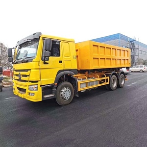 รถบรรทุก SINOTRUK HOWO 10 ล้อ คุณภาพส่งออก พร้อมตู้คอนเทนเนอร์อัดขยะเคลื่อนที่ สำหรับสถานีขนถ่ายขยะมูลฝอยในเขตเทศบาล - Product Image 1
