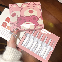 Boîte d'emballage de rouge à lèvres cosmétique personnalisable faite à la main, en forme de livre, en carton rigide, avec pelliculage mat, gaufrage et fermeture magnétique