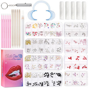 Kits de Grossiste Populaires de <span class=keywords><strong>Cristaux</strong></span> pour Bijoux Dentaires avec Colle, Strass Dentaires DIY en Verre à Dos Plat, Kits de Décoration pour Dents - Product Image 1