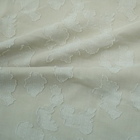 Tissu jacquard tissé en polyester 5219 avec découpes et motifs floraux 3D