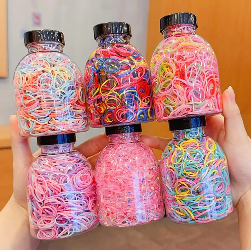 Yeni kızlar renkli tek kullanımlık elastik lastik bant çocuk şeker renk saç bağları bebek sevimli 1000 adet/kutu TPU kafa halatlar