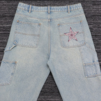 Jean cargo vintage personnalisé avec patchwork drapeau américain, denim rétro coupe droite avec rayures cloutées et broderie étoile