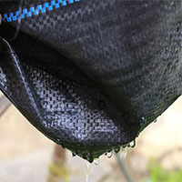 Tissu non-tissé de Spunbond de tapis de mauvaises herbes d'agriculture noire avec la barrière de mauvaise herbe de service de coupe