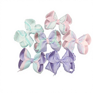 โบว์ติดผมสีพาสเทลรูปทรงนางเงือก ทำด้วยมือด้วยริบบิ้นมูนสติทช์ ประดับด้วยลูกไม้และไข่มุก น่ารักสำหรับเด็กวัยหัดเดินและเด็กเล็ก เหมาะสำหรับงานปาร์ตี้เจ้าหญิง - Product Image 1