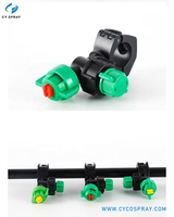 Buse de pulvérisation à clipser en plastique, avec bouchon à vis vert, embout jaune et corps noir, pour lignes de refroidissement et de lavage