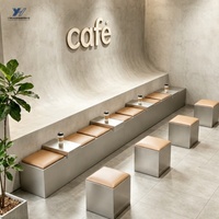 Sièges de banquette de style industriel en acier inoxydable modulaire avec coussin en PU beige pour restaurant, hôtel, hall d'entrée