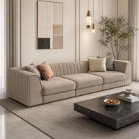 Canapé modulaire de luxe italien YUANCHANG en cuir artificiel, en forme de L, avec structure en bois de larch et d'eucalyptus, et pièces en acier inoxydable