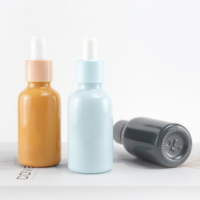 Nouvel emballage cosmétique conçu de bouteille en verre opale de cylindre de 30ml avec le chapeau de compte-gouttes pour l'emballage cosmétique