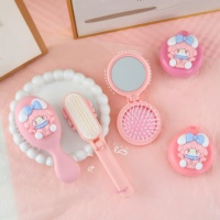Miroir cosmétique rond pliable en plastique à double face éclairé avec couleur et logo personnalisés