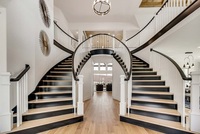 Escalier d'arc d'escalier incurvé de fantaisie de duplex avec la balustrade en fer forgé pour le prix usine de style australien de projet de villa