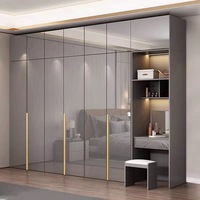 Armoire de luxe moderne pour chambre à coucher, nouveau design, lumières LED, armoire en bois et verre