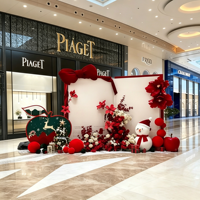 Cadre photo LED autoportant de Noël avec nœud en velours et motif pomme, arrangement floral pour boutique de bijoux de luxe et hall de centre commercial