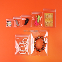 Petit emballage de bijoux en PVC personnalisé sac en plastique à fermeture éclair sac à fermeture éclair transparent pour boucle d'oreille logo réutilisable mini sac de pochette à fermeture éclair en PVC