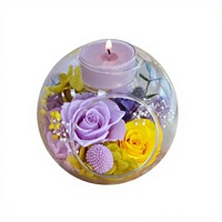 Bougie aromatique à la fleur préservée sous cloche en verre pour la décoration de la maison