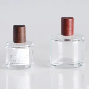 New Design Empty Clear Cylinder Glass Luxury Perfume Spray Bottle With Wooden Grain Cap