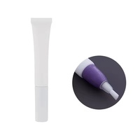 Tube en plastique souple de forme ronde pour le maquillage et le massage du brillant à lèvres avec applicateur spécial pour les soins de la peau et les masques faciaux